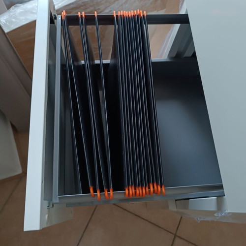 Metal filing cabinet with hanging folders and lock used