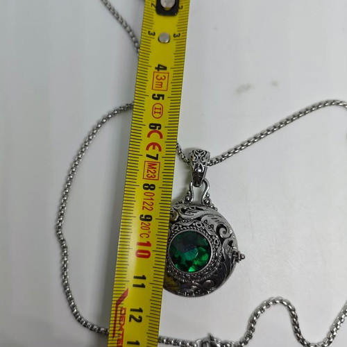 Locket pendant with green crystal vintage like new