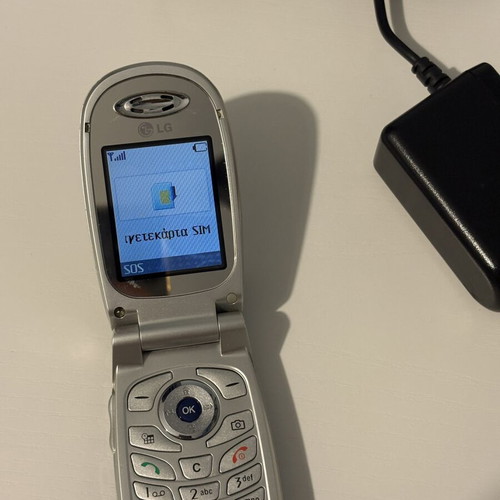 Vintage LG C2200 flip phone (2004), blue, with camera