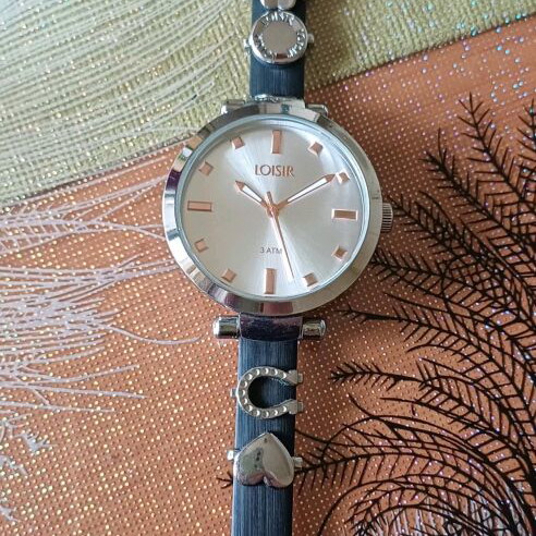 Loisir women's watch like new with black leather strap and rose gold details