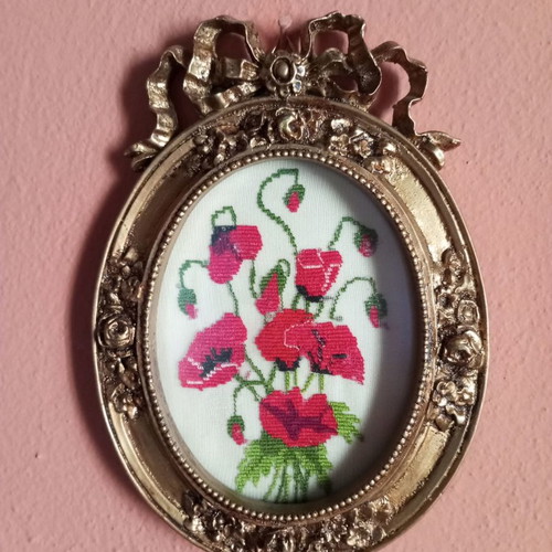 Embroidered frames used, hand-stitched