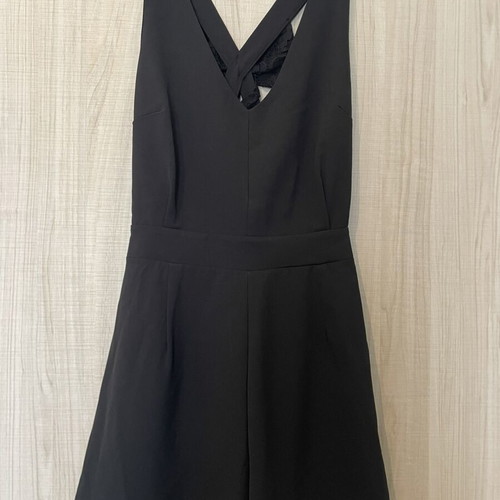 Black playsuit used with lace details and open back, size M