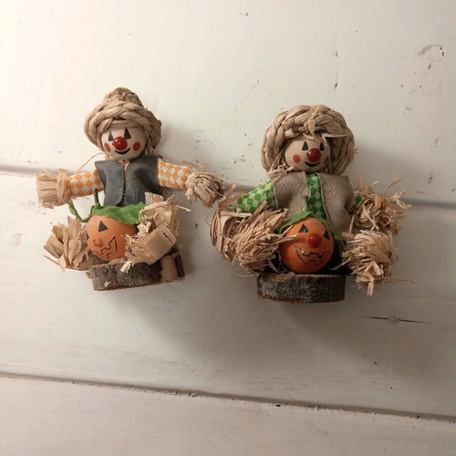 Set of two scarecrow figurines with pumpkin made of natural materials like new