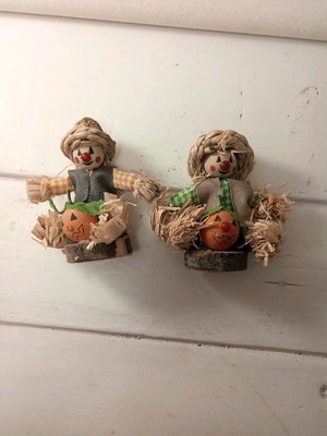 Set of two scarecrow figurines with pumpkin made of natural materials like new