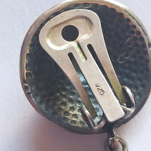Silver earrings used, large with clips, black and silver
