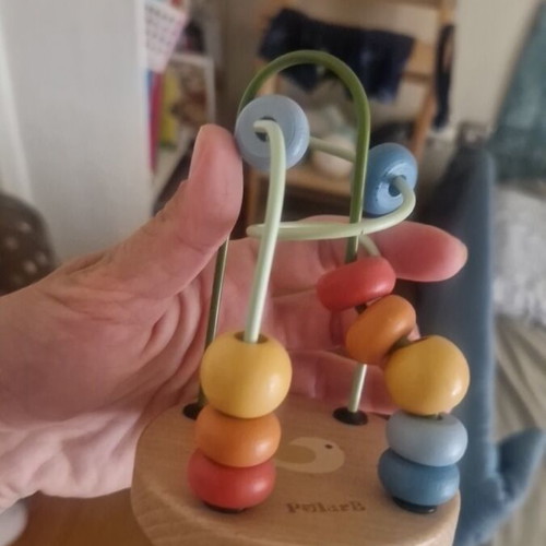 Wooden baby toy for fine motor skills and observation