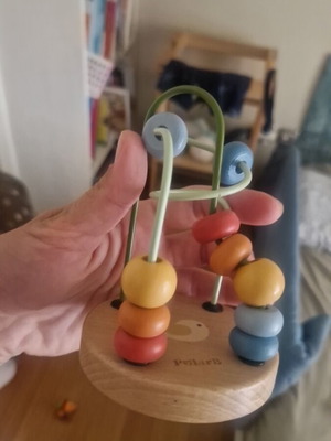 Wooden baby toy for fine motor skills and observation