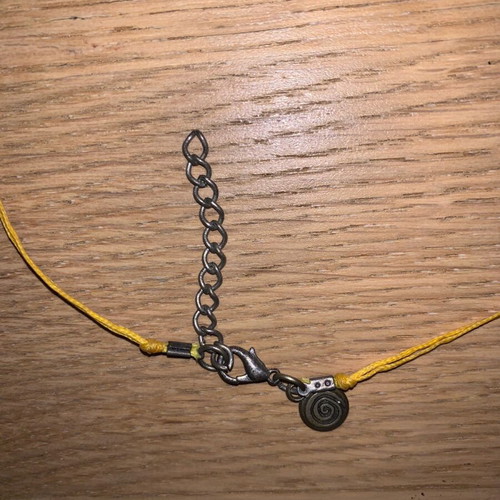 Chunky necklace used with floral metal and ceramic elements