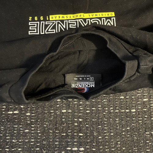 McKenzie shirt like new, size small, black multicolor