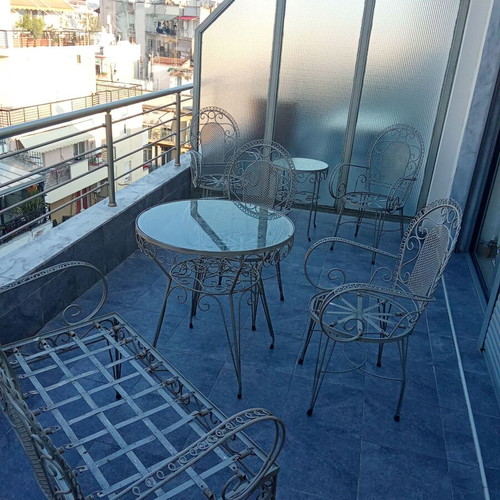 Fer Forge garden sofa set like new with chairs, tables, and two-seater couch