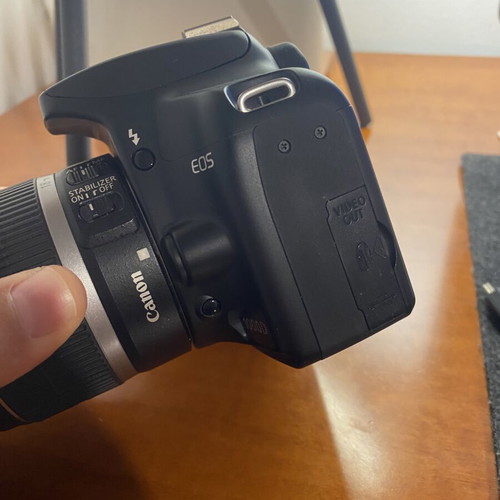 Canon EOS 1000D DSLR with EF-S 18-55mm IS lens, used