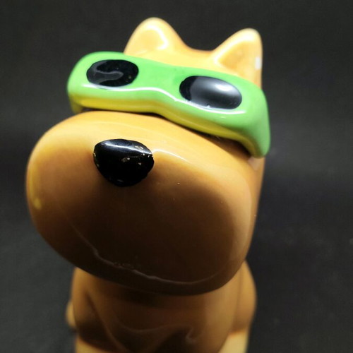 Ceramic dog piggy bank used, orange with sunglasses