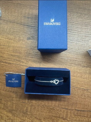 Swarovski silver bracelet with heart detail like new