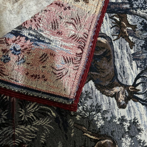 Handmade wall tapestry with deer and dogs