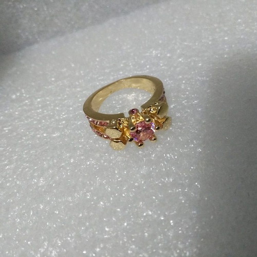 Ring with pink stones like new, gold plated size 6