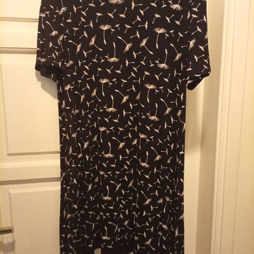 Black and white elastic mini dress with asymmetric sides