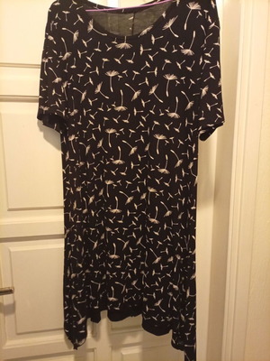 Black and white elastic mini dress with asymmetric sides