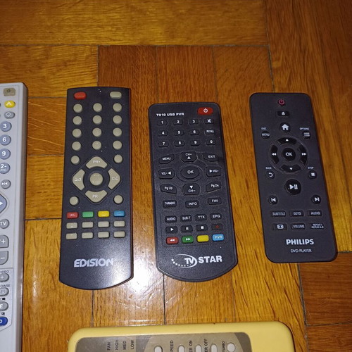 Set of 7 different TV remote controls