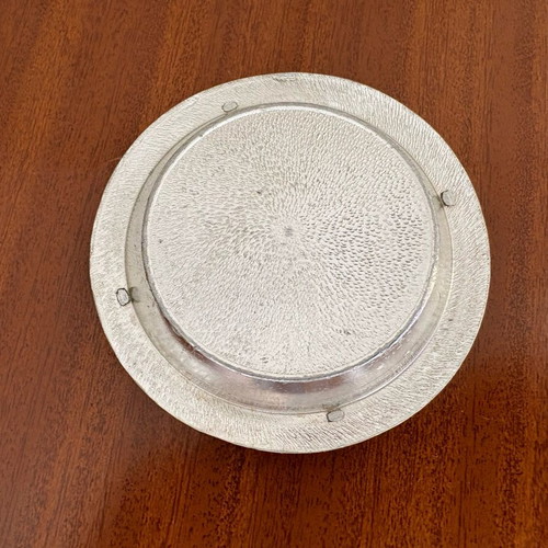 Vintage metal ashtray used with floral embossed details, 1970s