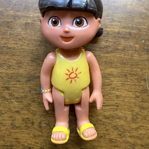 Dora the Explorer figure in yellow swimsuit used by Mattel and Viacom