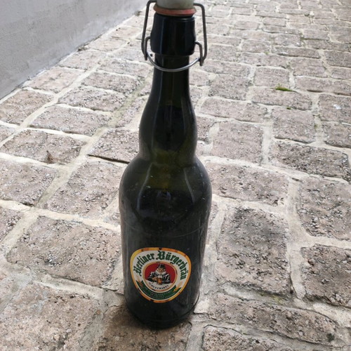 Large used collectible Berliner Burgerbrau beer bottle