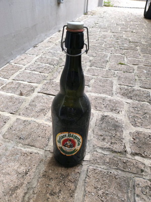 Large used collectible Berliner Burgerbrau beer bottle