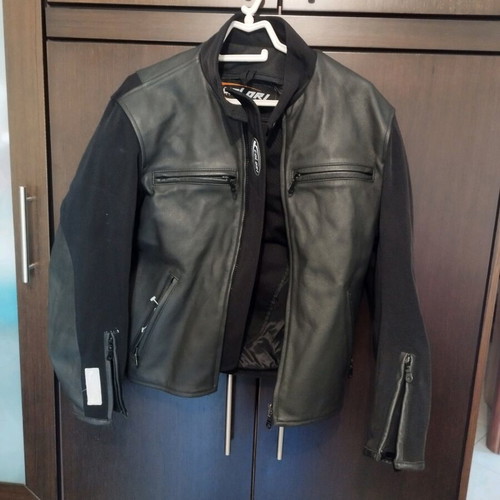 Colori women's motorcycle jacket like new, size small with shoulder protection