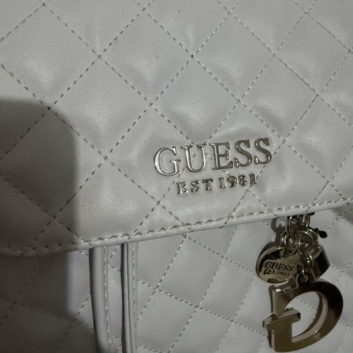 Guess Backpack white like new with silver details and charm