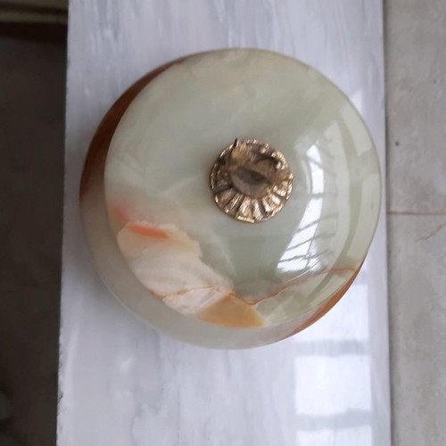 Decorative item used, green onyx with gold legs and handle