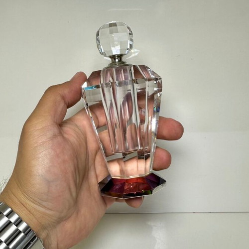 Vintage faceted crystal perfume bottle with iridescent prism base