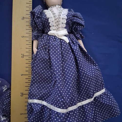 Vintage Slavic doll with porcelain head and fabric body
