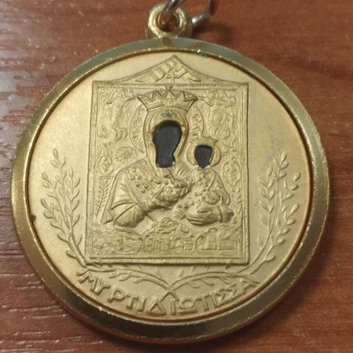 Metal religious amulet from Italy