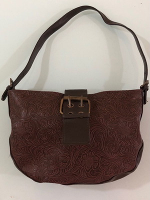 Women's brown shoulder bag used with embossed design