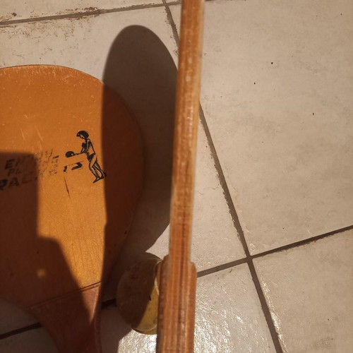 Wooden beach rackets used, pair with ball