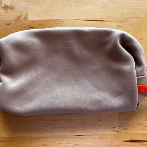 Burgundy soft toiletry bag with zip used