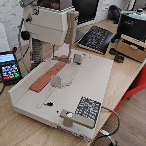 Drill for printing shop used with spare drill bits