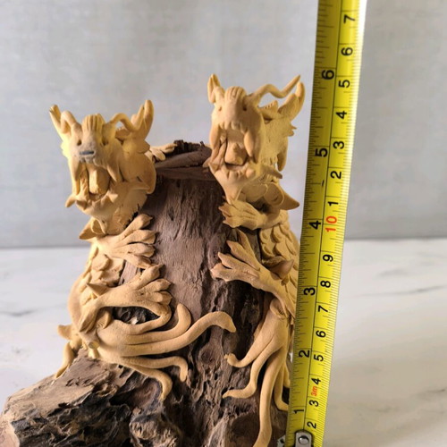 Wooden carved dragons used on wooden base