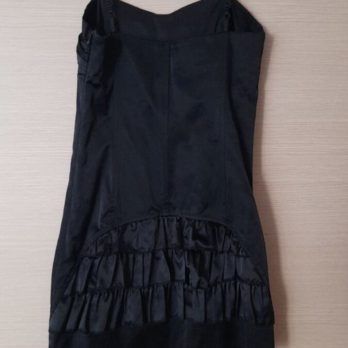 Mini black dress like new, size M, with side zipper and ruffles