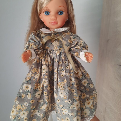 Nancy Famosa doll 2010 with 3 vintage dresses