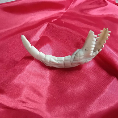 Crocodile made of camel bone used, in very good condition