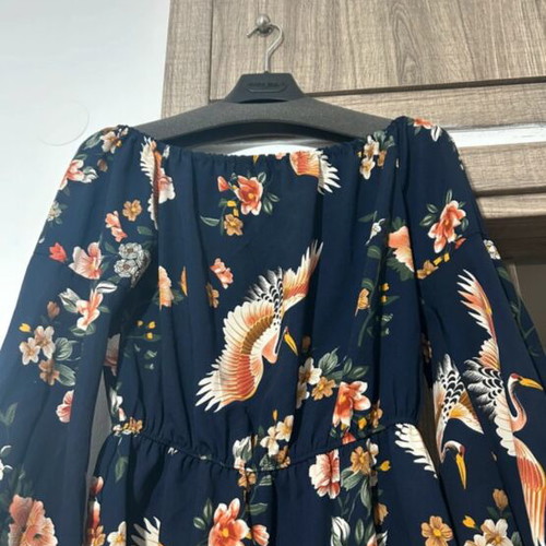 Women's blouse with off-shoulder design like new, blue floral