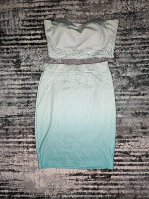 Women's clothing set used, turquoise with lace details