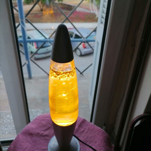 Led lava lamp yellow with silver effect, like new