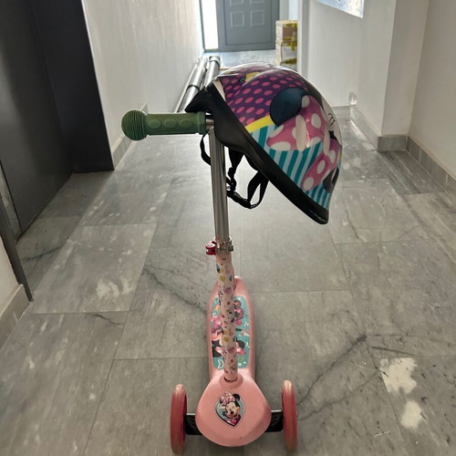 Minnie Scooter with Helmet like new, lightly used