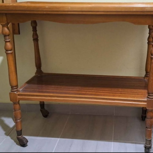 Wooden coffee table used with wheels