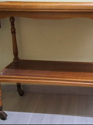 Wooden coffee table used with wheels