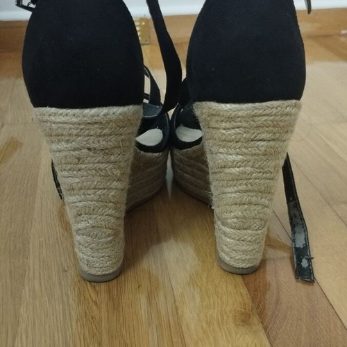 Black platform shoes used with strap wear, size 39