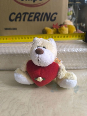 Small teddy bear with heart like new