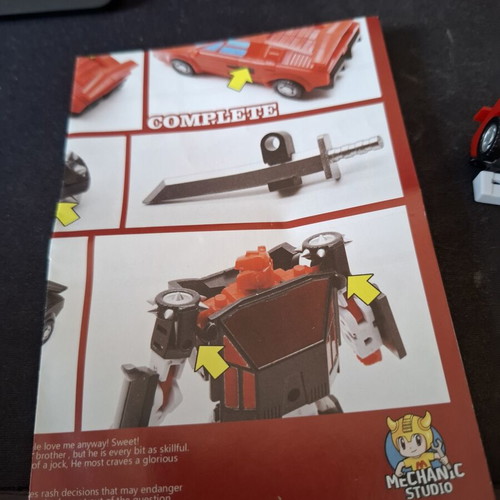 MFT Sideswipe action figure with accessories and instructions