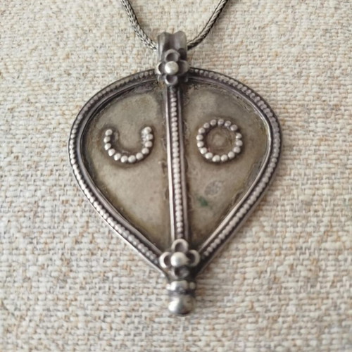 Vintage necklace with 925 silver chain and large ethnic pendant used